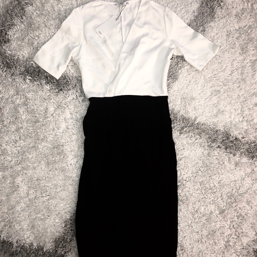 Classy, sophisticated dress for work.